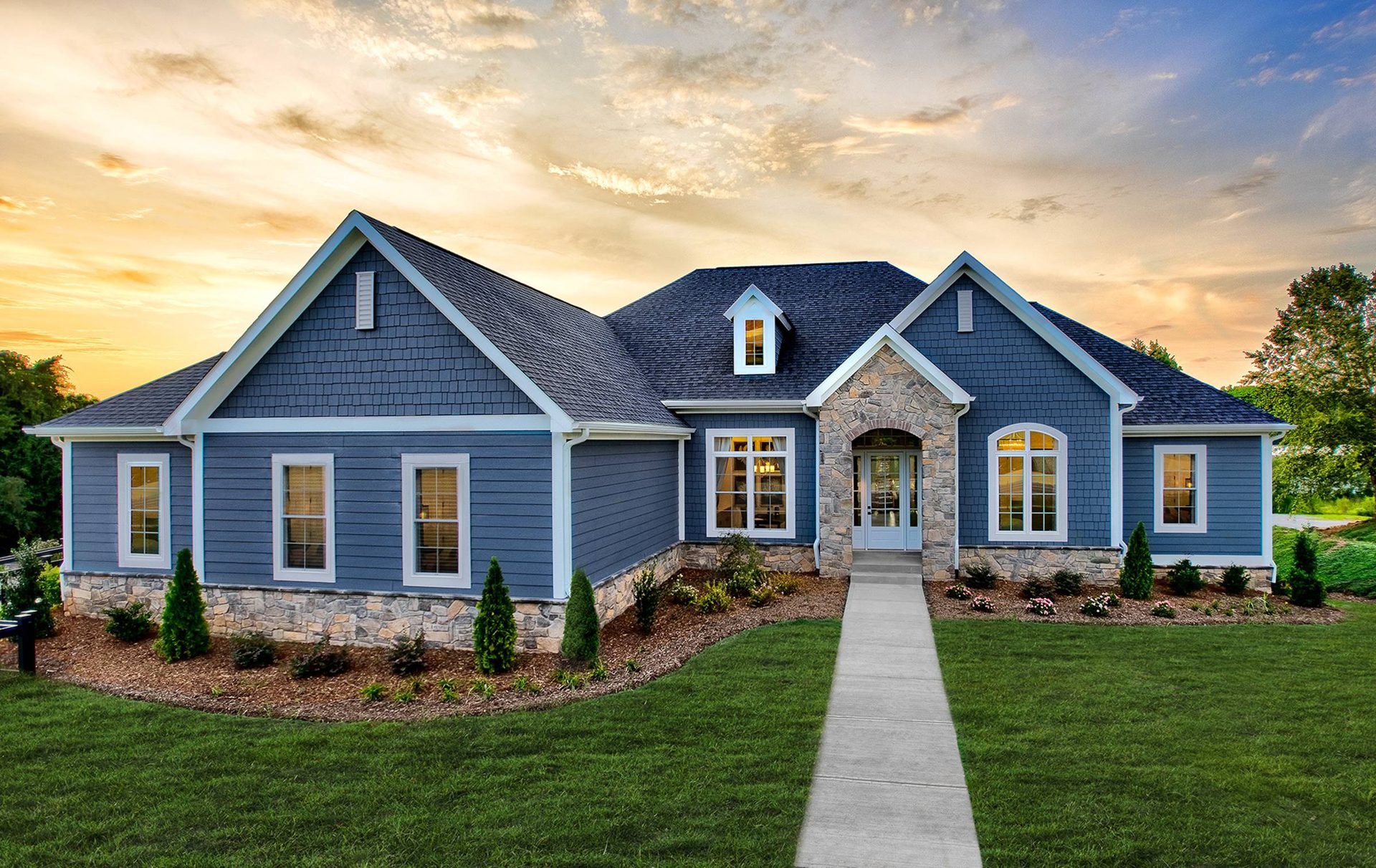 Well-maintained suburban single-family home at sunset